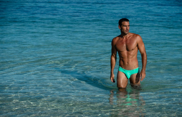 Lifestyle editorial image featuring Cocksox CX79 men's boy-leg swimwear briefs in Amalfi