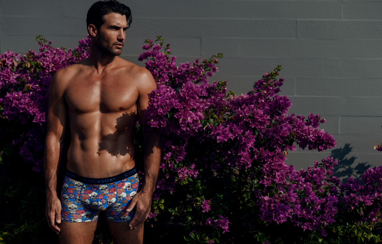 Lifestyle editorial image featuring Cocksox CX12DD Day of the Dead Collection men's underwear boxers in Calavera Blue print